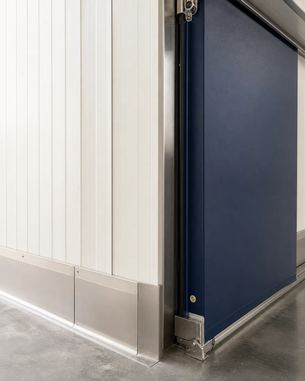 Industrial sliding door and insulated panel construction detail